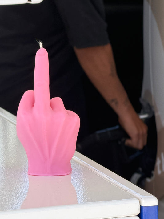 pink rude finger candle